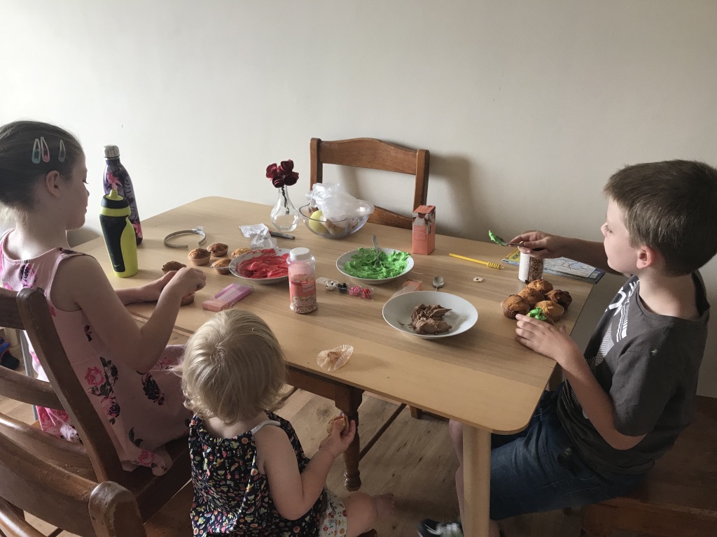 Decorating the cupcakes